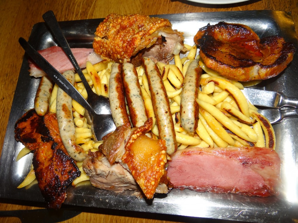 Meat sampler. My favorite was the pork with delicious crispy skin...very different than anything I have had. 